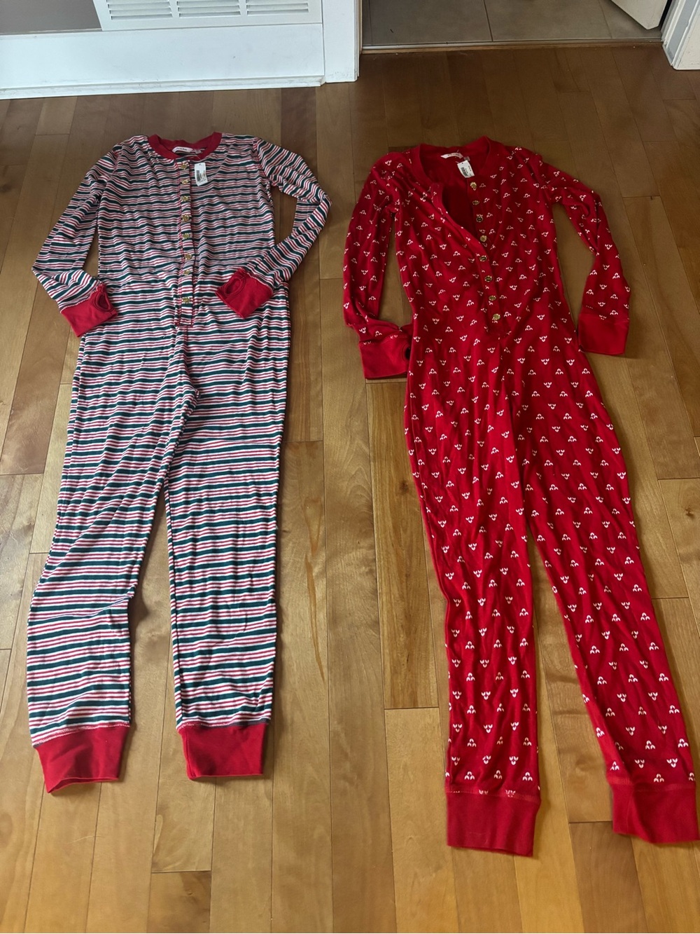 Two Christmas pjs. Size small